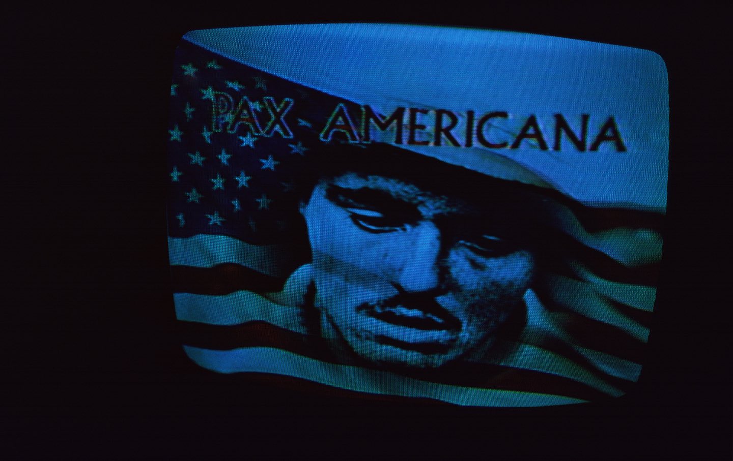 television screen with soldier and american flag; pax americana
