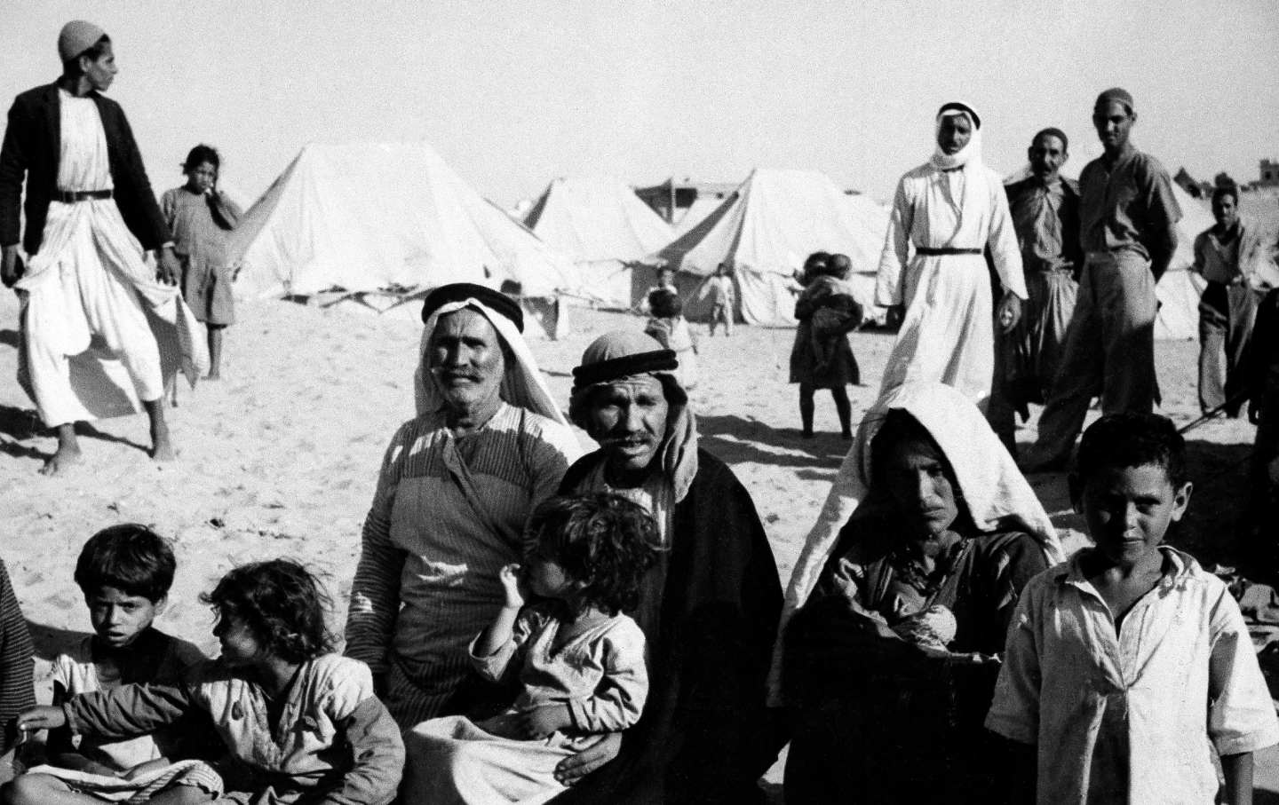 This family owned their own farm near Haifa. They fled when the British mandate ended and it became certain Israel would control the town. Today they are refugees in a camp near Gaza. The only possession they still have is a padded blanket.