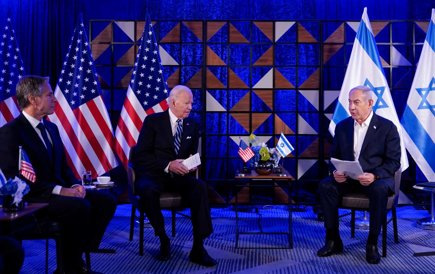 Israeli Prime Minister Benjamin Netanyahu speaks as he meets with President Joe Biden, Wednesday, October 18, 2023, in Tel Aviv, as US. Secretary of State Antony Blinken, looks on, left.