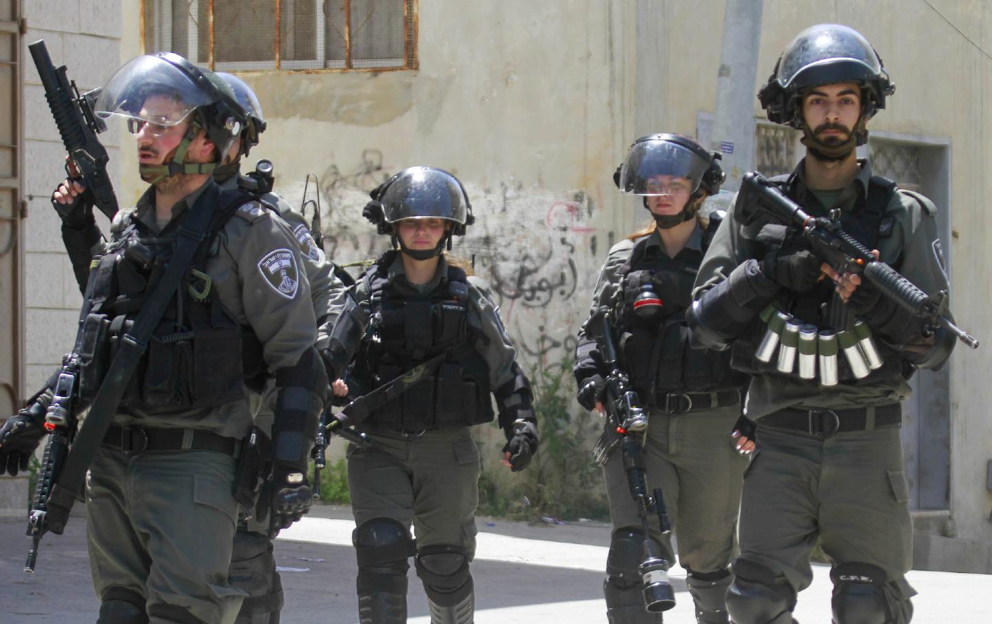 Israeli soldiers prepare to arrest Palestinians in the village of Shweika, near Tulkarm, in the northern West Bank.