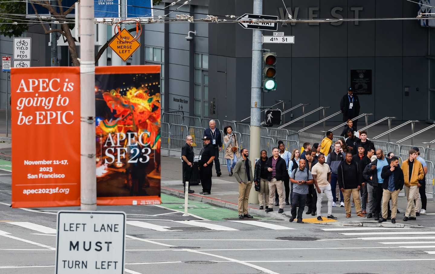 Attendees make their way into Moscone South for the Asia-Pacific Economic Cooperation summit held at Moscone Center in San Francisco, Tuesday, November 14, 2023.