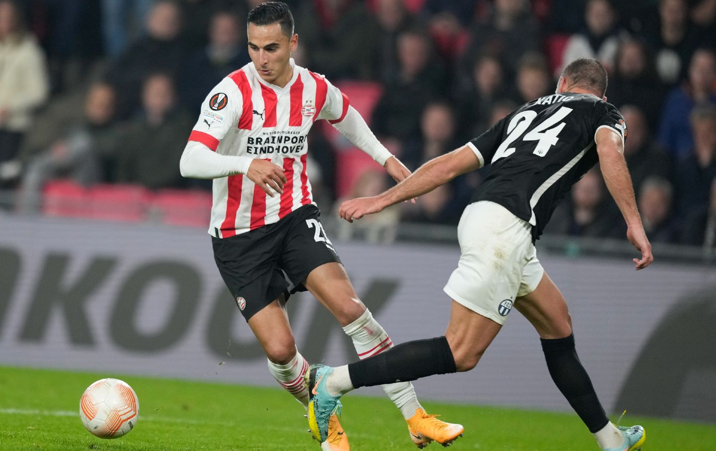 Then-PSV's and currently Bundesliga's Mainz player Anwar El Ghazi, left, scores his side's fifth goal during the Europa League group A soccer match between PSV and Zurich at the Philips stadium in Eindhoven, Netherlands, on October 13, 2022.