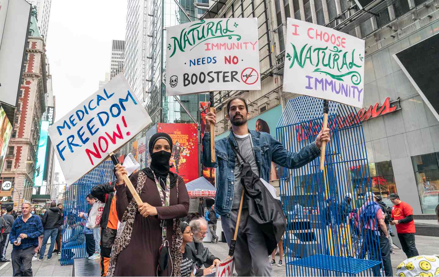 Thin crowd of anti-vaxxers protested on Times Square against vaccination mandates for many professions.