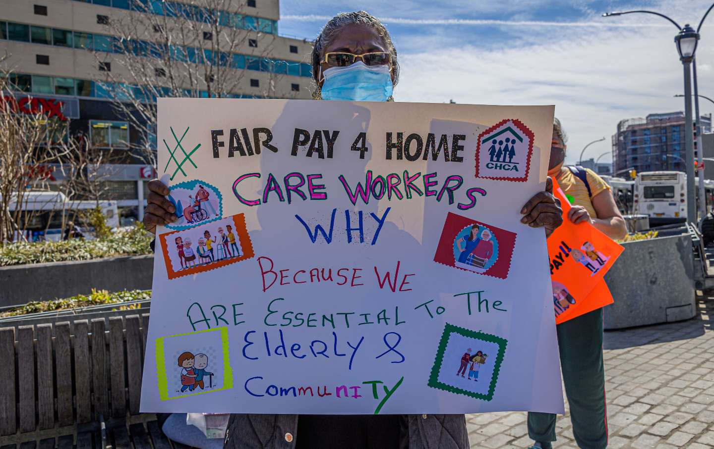 Home care workers, seniors, and people with disabilities holding a rally at the Fordham Bus Plaza in the Bronx in support of the Fair Pay for Home Care Act on March 12, 2021.