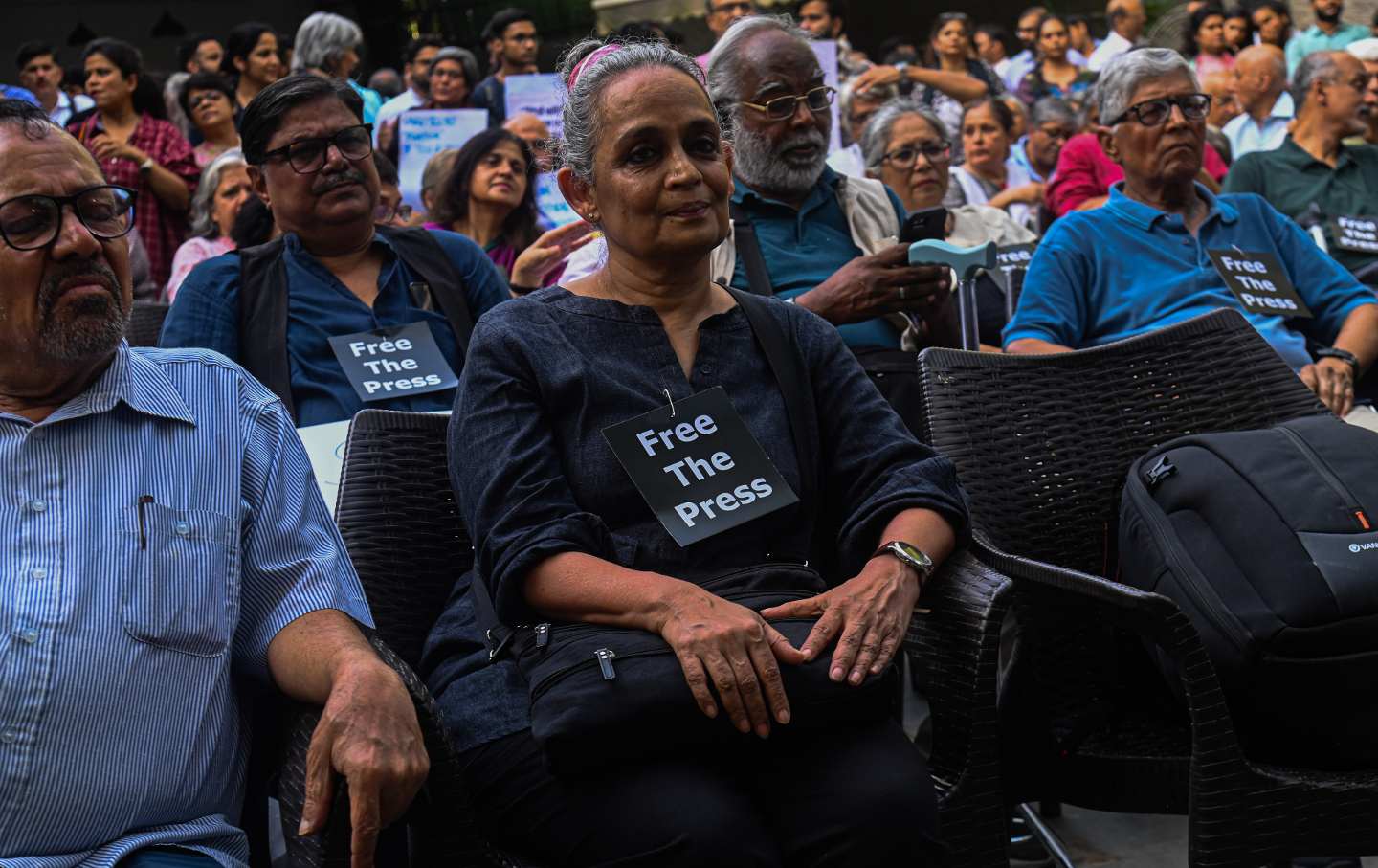 Arundhati Roy (C), attends a protest against the raids of homes of journalists and writers belonging a news portal in New Delhi, India on October 04, 2023.