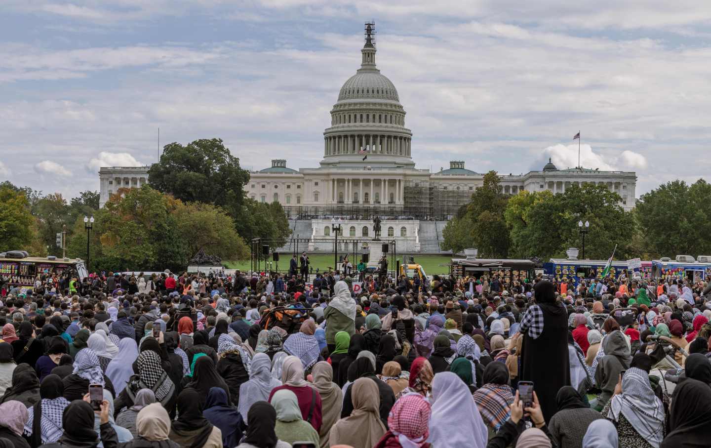 Muslims gather for Friday prayers in front of the Capitol Building in Washington D.C. and take part in a demonstration to express their solidarity with the Palestinian people.