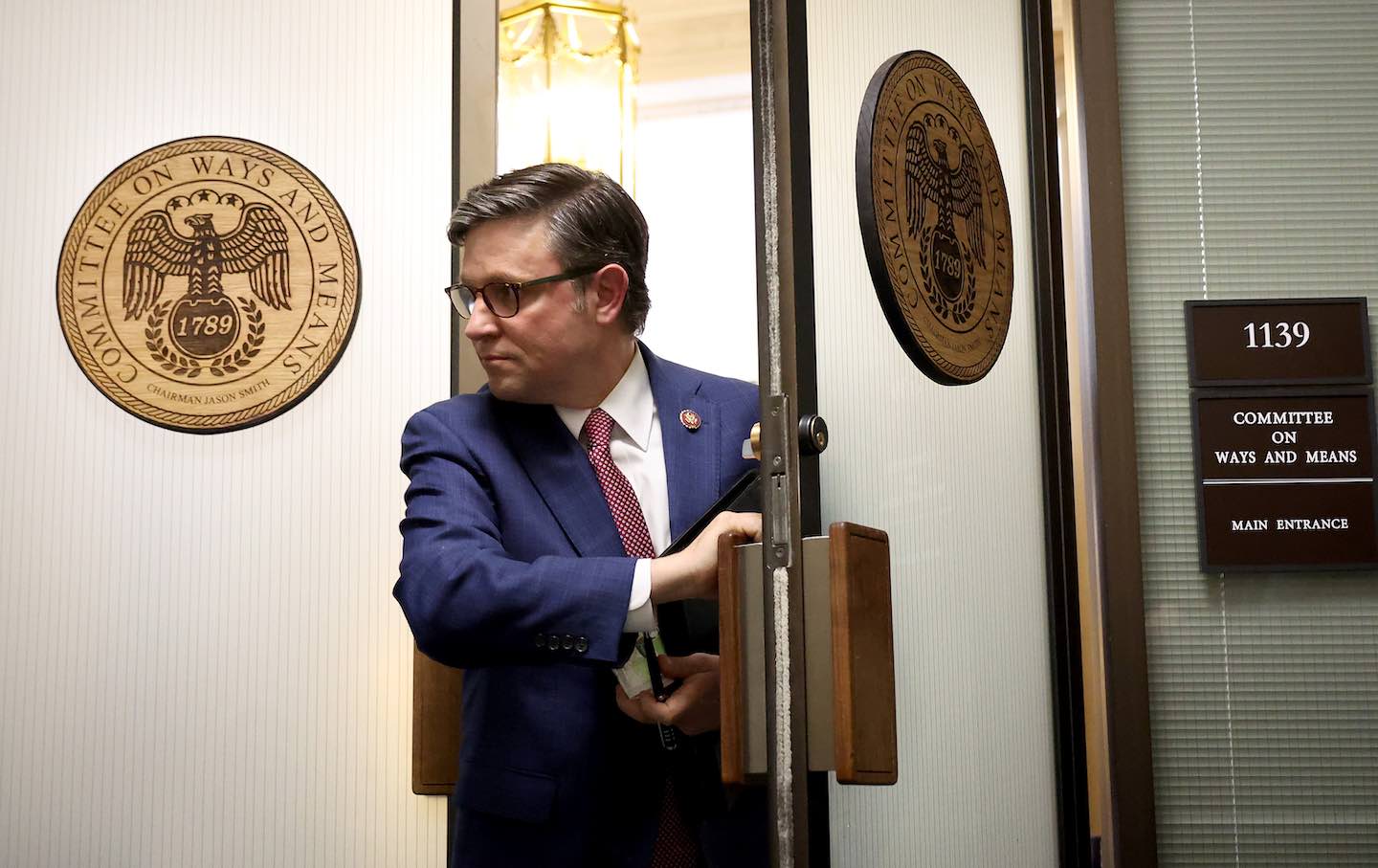 Representative Mike Johnson leaves a House Republican conference meeting in the Longworth House Office Building on Capitol Hill on October 24, 2023, in Washington, D.C.