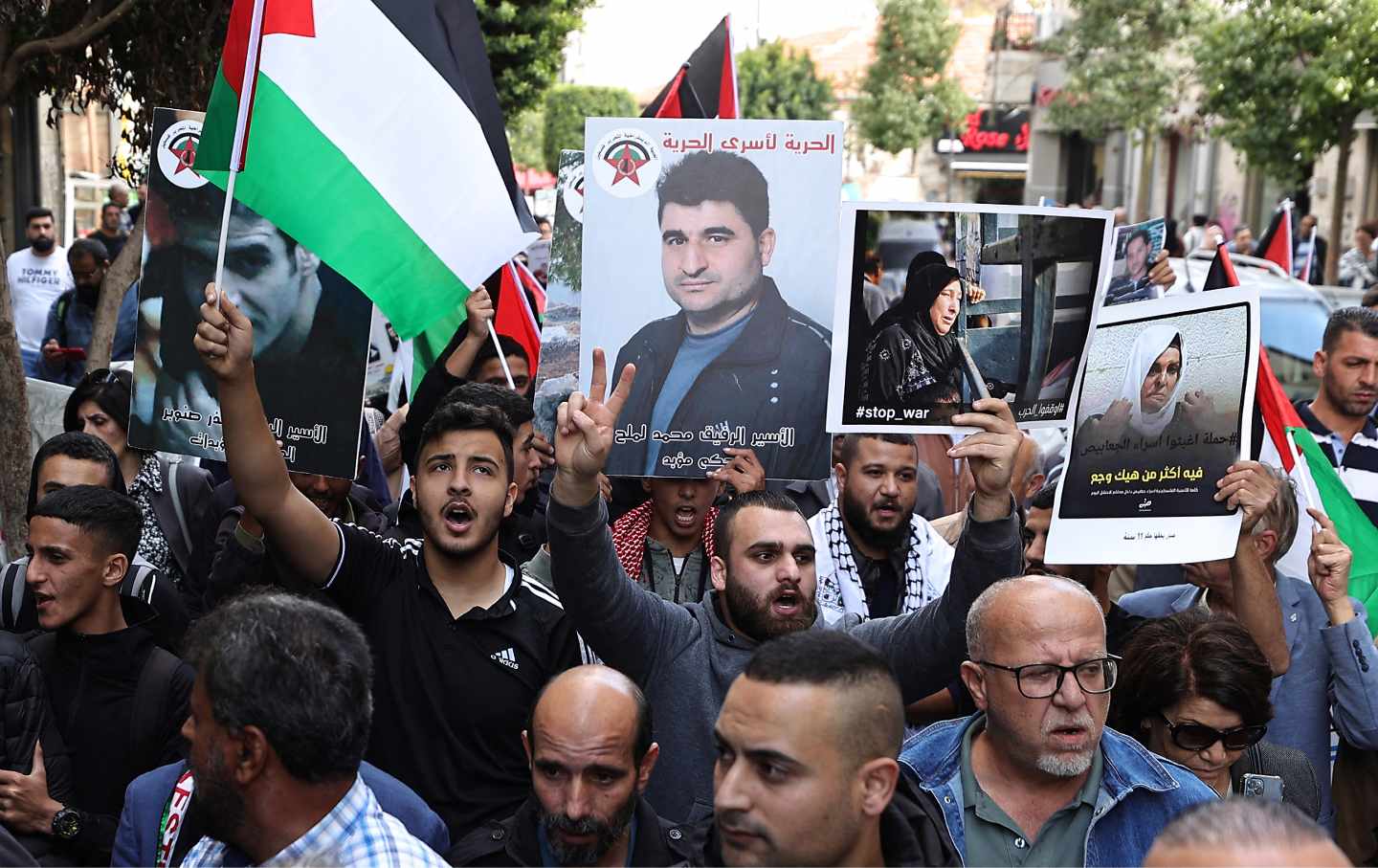 Protesters chant during a rally in Ramallah city in the occupied West Bank, in support of Gaza and of Palestinian prisoners in Israeli jails, on November 14, 2023.