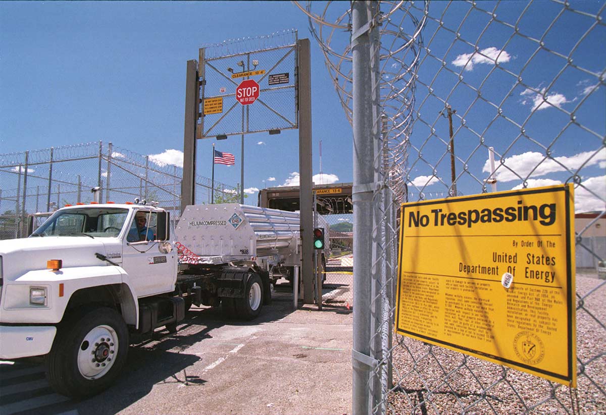 A truck rolls out from the heavily guarded, highly secretive plutonium facility at LANL.