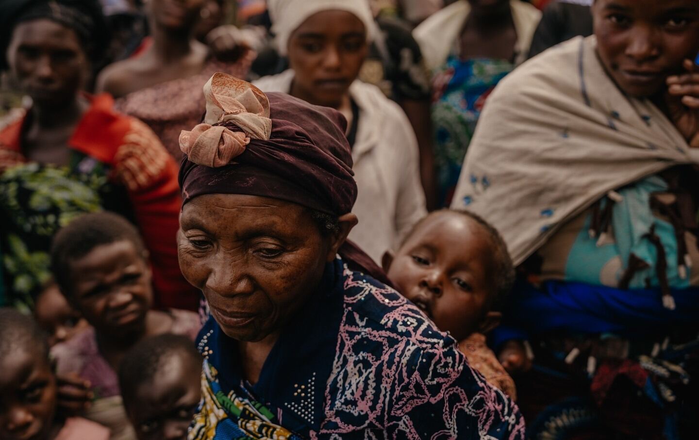 Marciane Ndamukunze, 68, arrives in Kizemba displacement camp, after fleeing heavy fighting in Masisi territory. 4th December 2023, North Kivu Province, DRC