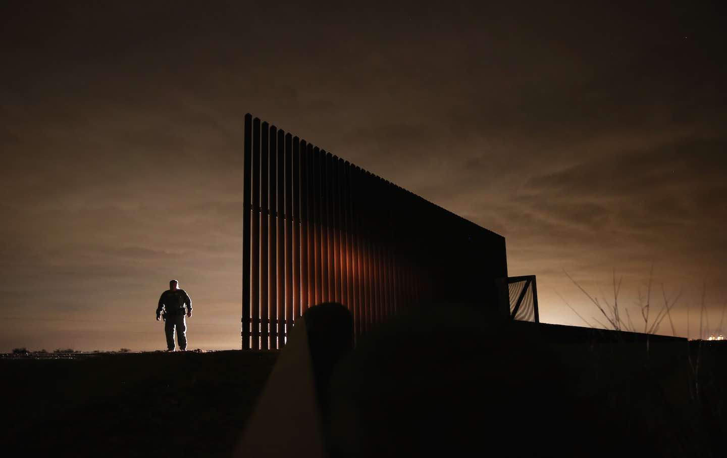 A US border patrol agent on patrol near La Joya, Tex., 2013.