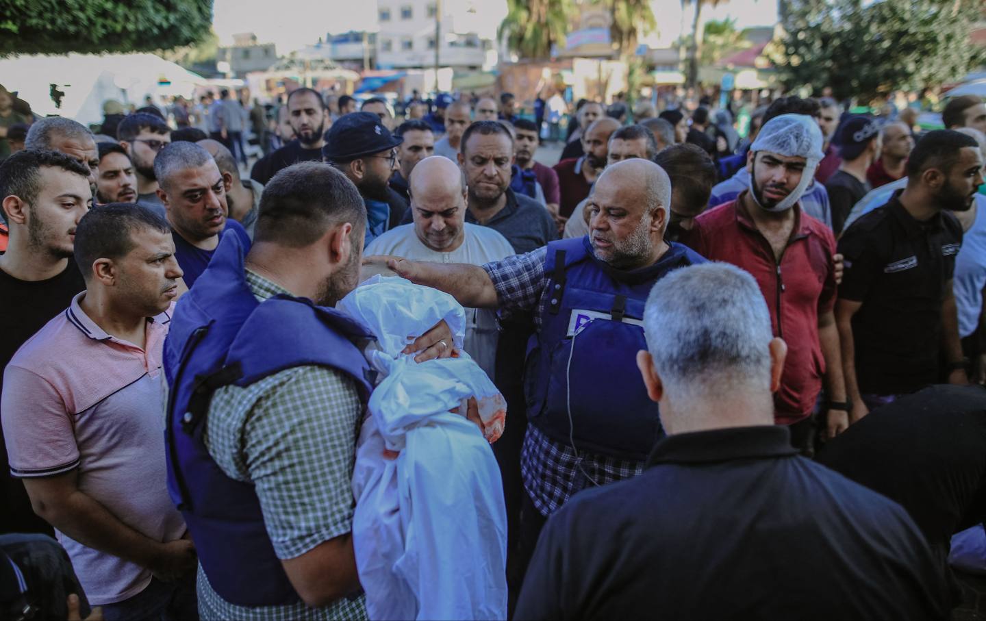 Al Jazeera correspondent Wael Al-Dahdouh bids a heart-wrenching farewell to his wife, son, and daughter during their funeral service in the heart of Gaza's Nuseirat camp.