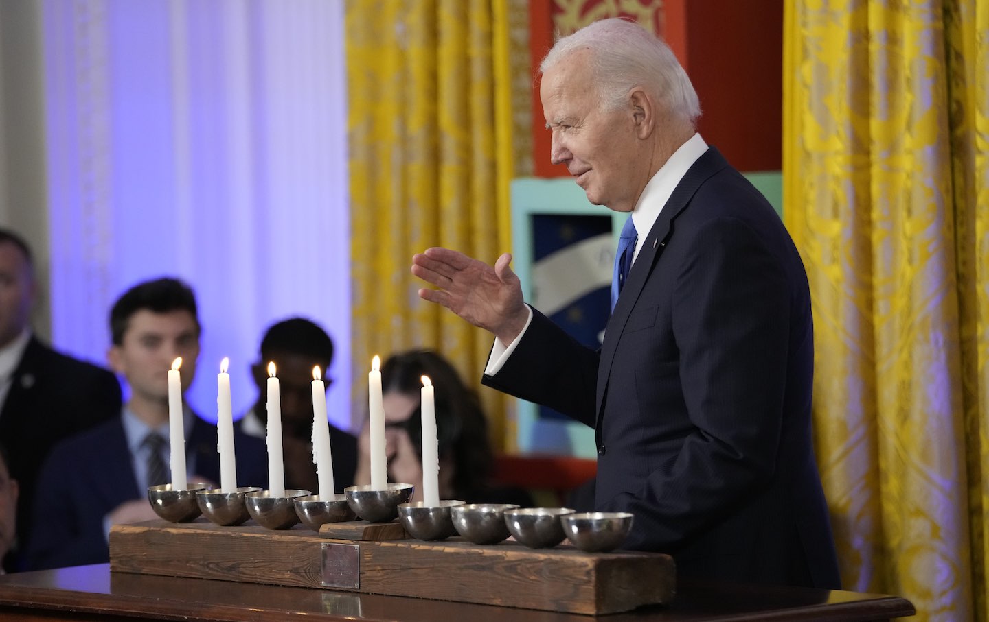 President Joe Biden speaks at a Hanukkah reception in the East Room of the White House in Washington, Monday, December 11, 2023.