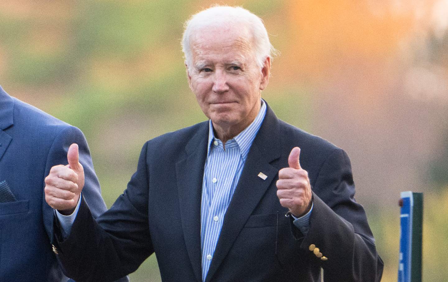 President Joe Biden gives two thumbs up as he leaves St. Joseph on the Brandywine Catholic Church in Wilmington, Del., on October 28, 2023.