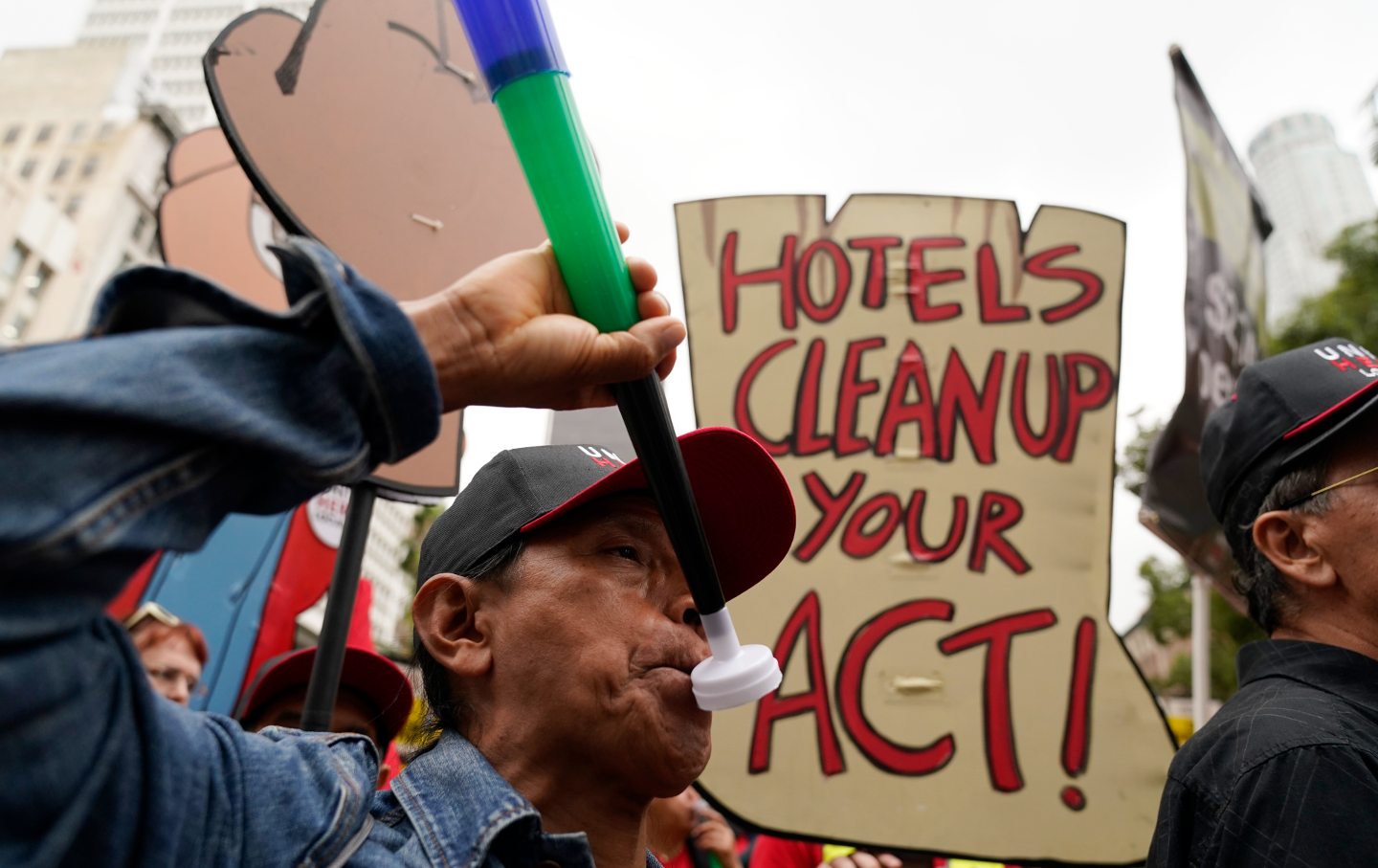 Hotel workers march to demand better wages Wednesday, October 25, 2023, in Los Angeles.