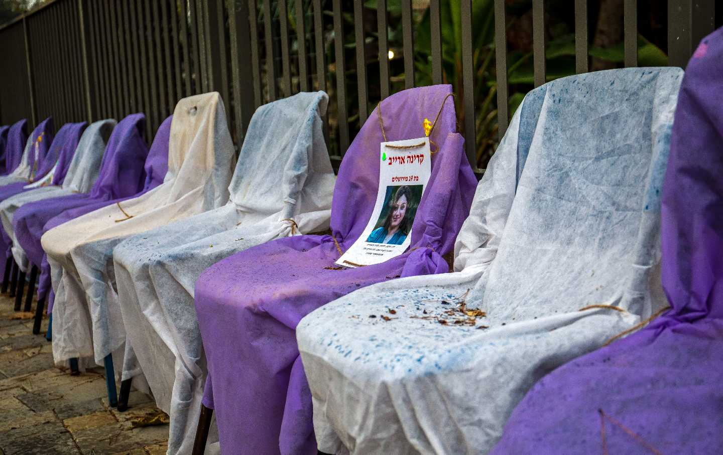 Posters of hostages at the entrance to a school in Jerusalem. Pictures of children who have returned from captivity have been removed and those who are still in captivity remain.