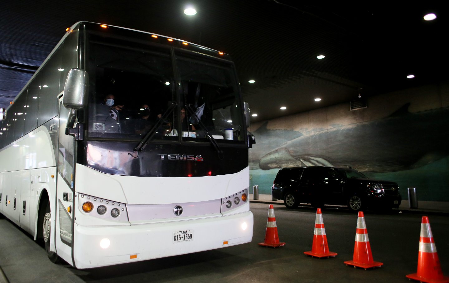 A bus with migrants coming from Texas arrives at Port Authority Bus Terminal on August 25, 2022, in New York City.