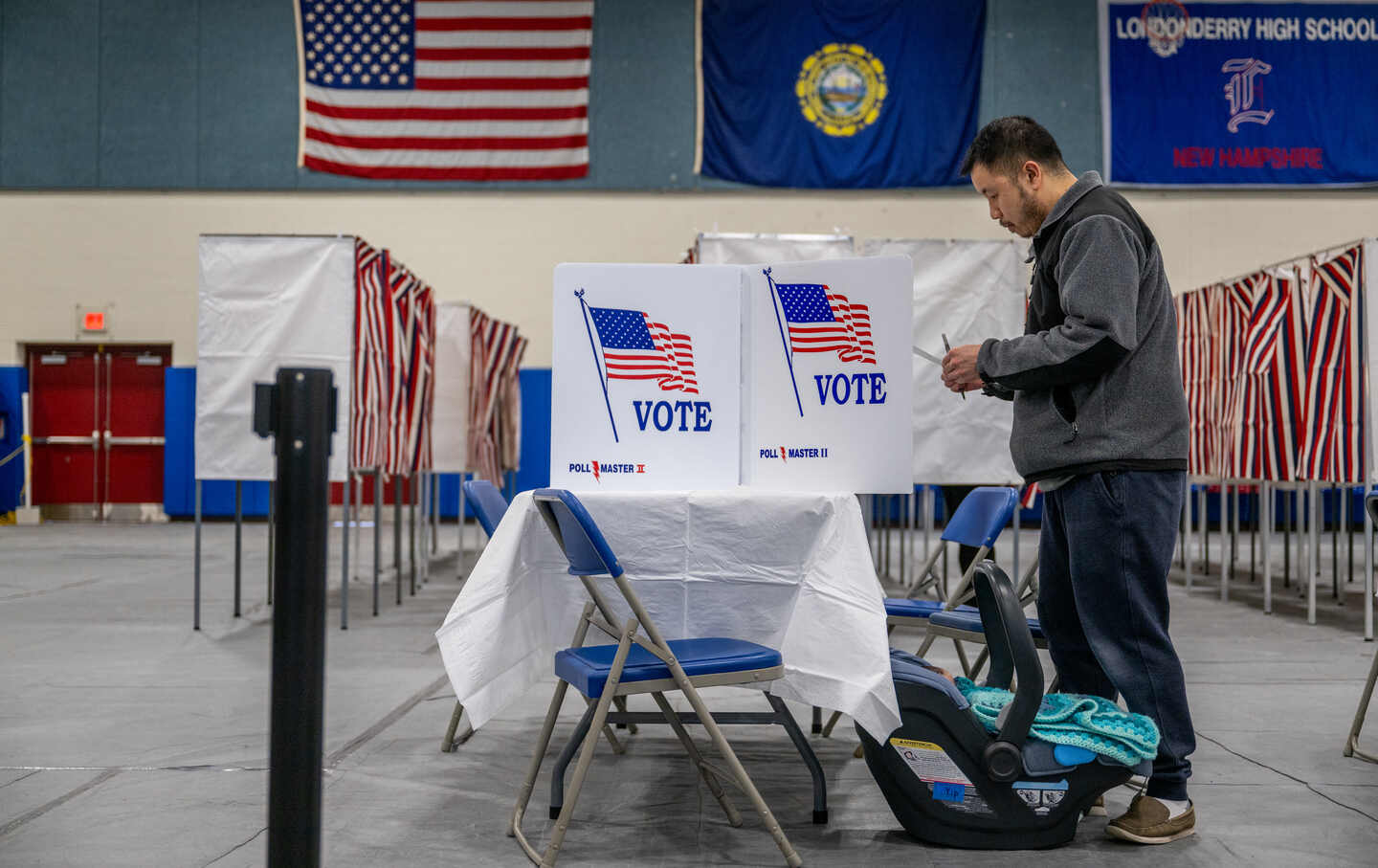 Jonathan Kipp prepares to cast his ballot in the New Hampshire Primary at Londonderry High School on January 23, 2024, in Londonderry