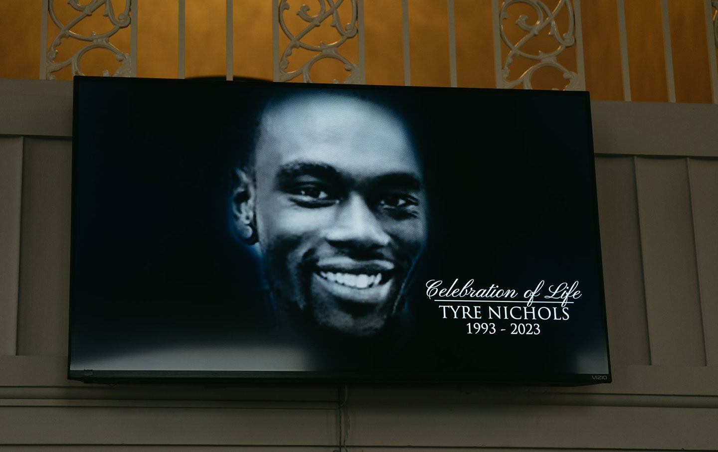 A screen at the entrance of Mississippi Boulevard Christian Church displays a picture of Tyre Nichols, who was beaten to death by police officers in January 2023.