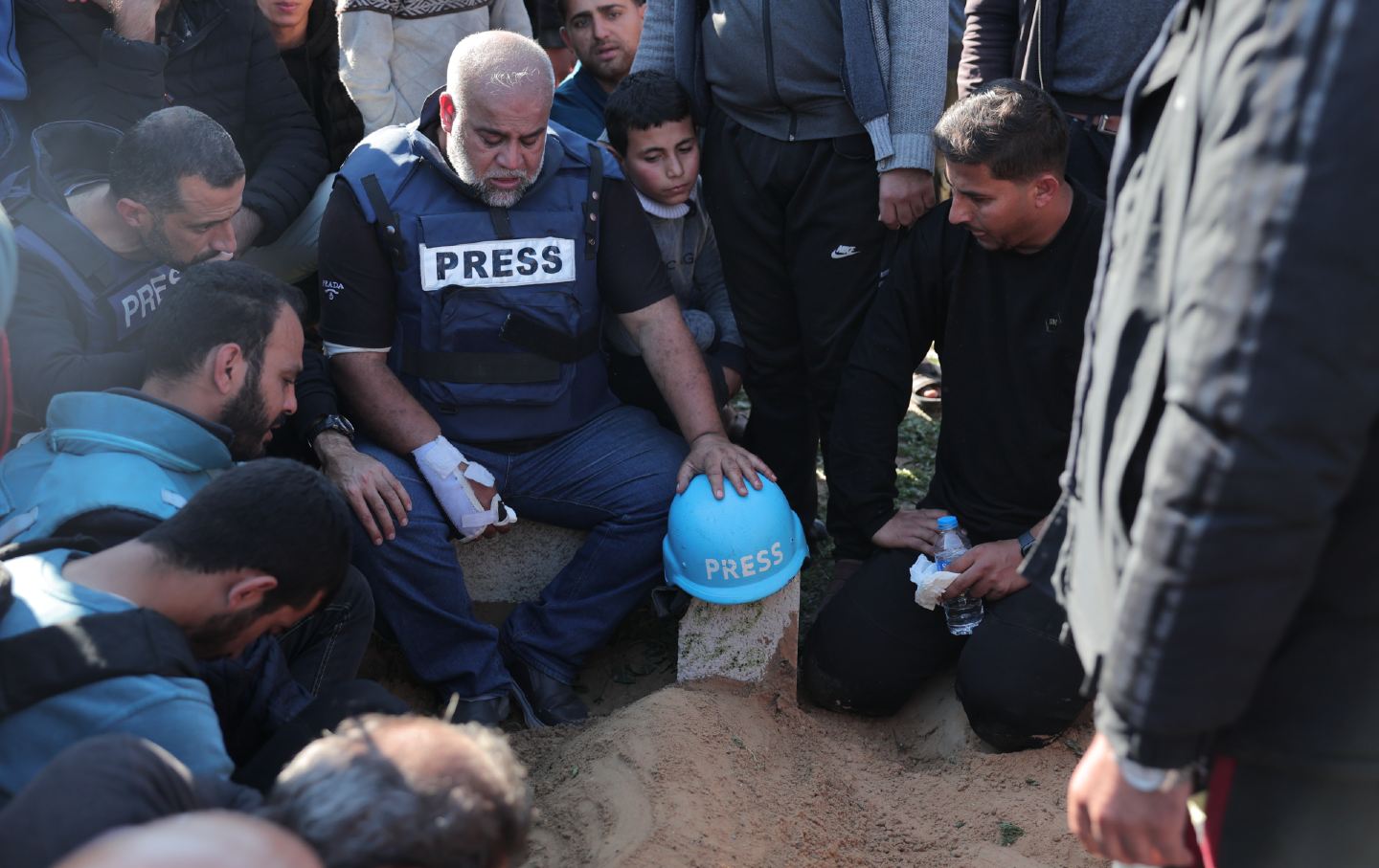 Al Jazeera reporter Wael Dahduh lost his wife, son, daughter and grandson in Israeli airstrikes on October 25, 2023. In the photo from January 7, he mourns his son, another journalist killed by Israel.