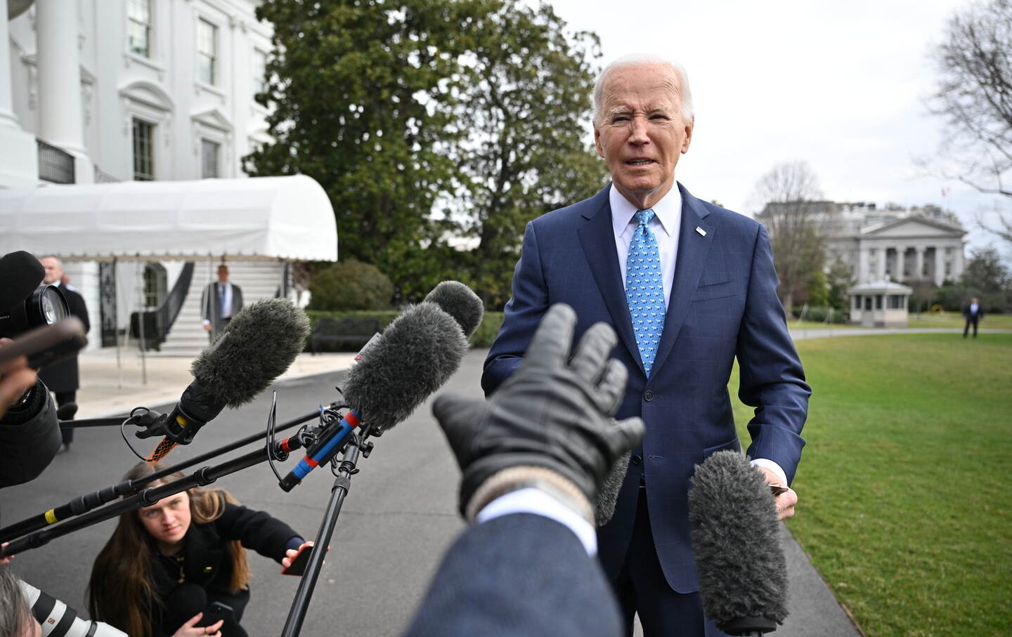 US President Joe Biden speaks to reporters before boarding Marine One on the South Lawn of the White House in Washington, D.C., on January 30, 2024, saying he had decided on a response to a deadly drone strike on US forces in Jordan but did not seek a wider war in the Middle East.