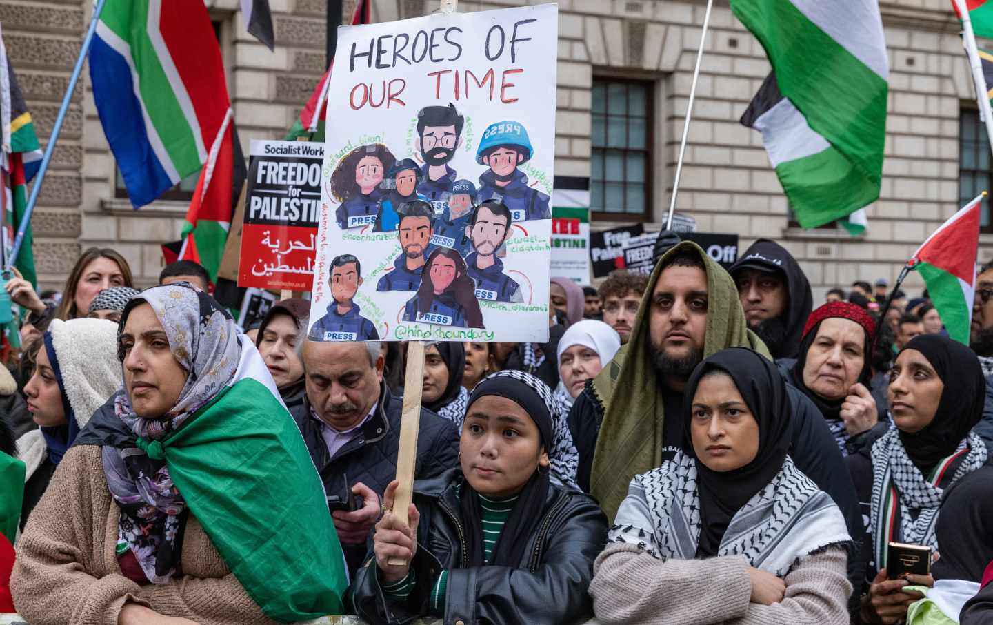 A pro-Palestinian protester holds a handmade placard paying tribute to Palestinian journalists at a rally in Whitehall to call for an immediate ceasefire in Gaza and an end to Israel's occupation on 3rd February 2024 in London, United Kingdom.