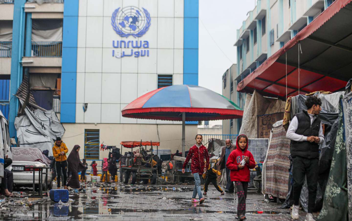 Palestinian families take refuge under harsh conditions at a school affiliated to the United Nations Relief and Works Agency for Palestine Refugees (UNRWA) at the Daraj neighborhood as the Israeli attacks continue in Gaza City, Gaza on February 6, 2024.