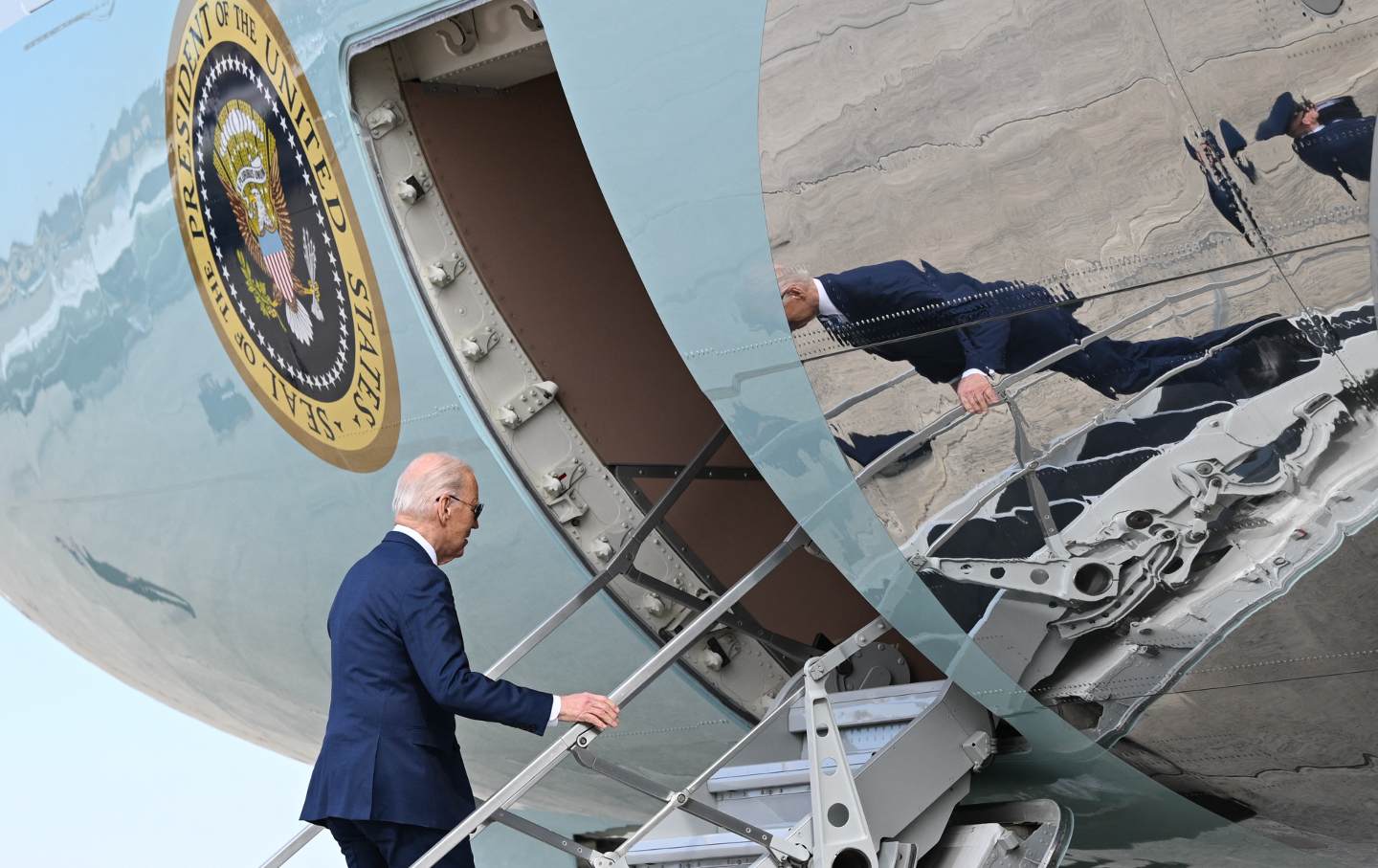 US President Joe Biden boards Air Force One before departing from Joint Base Andrews in Maryland on February 16, 2024.