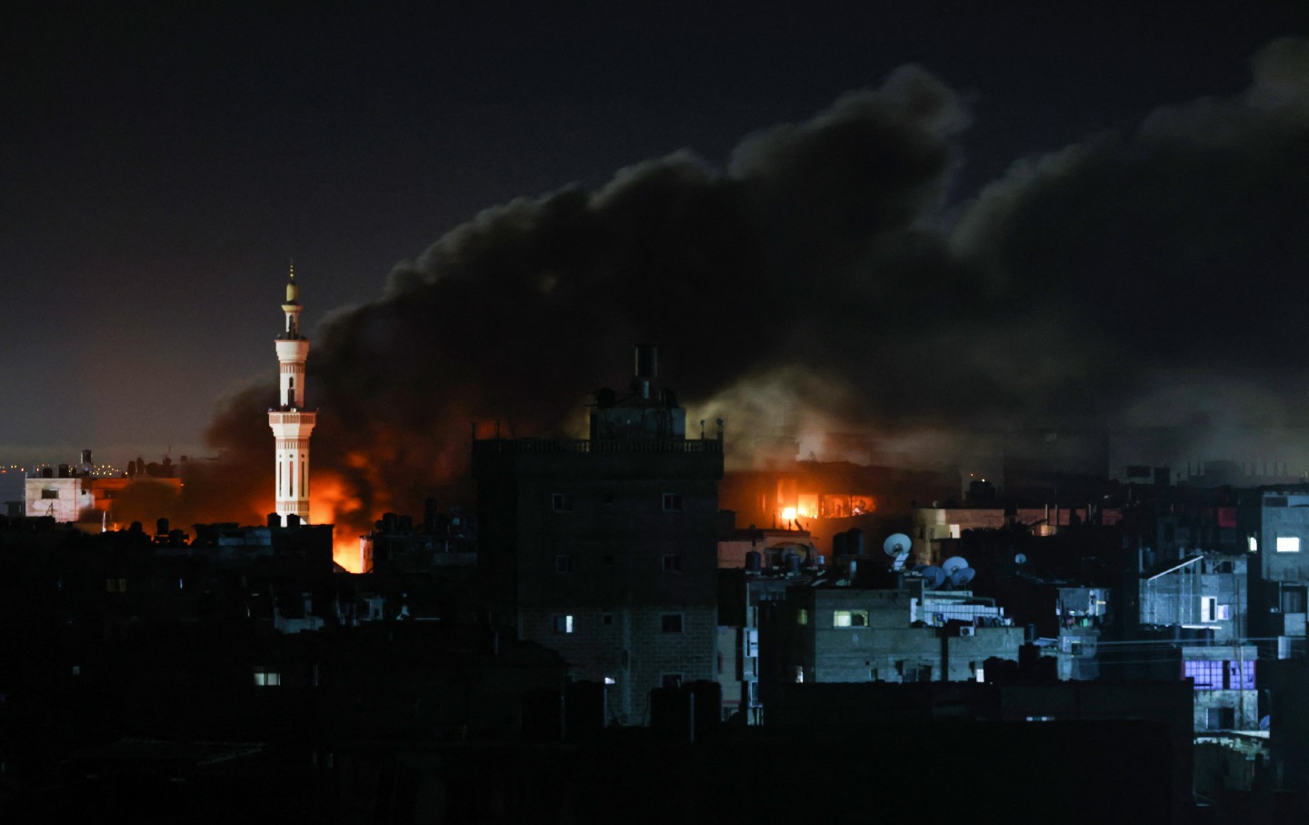 Smoke billows during the Israeli bombardment of Rafah in the southern Gaza Strip on February 12, 2024.