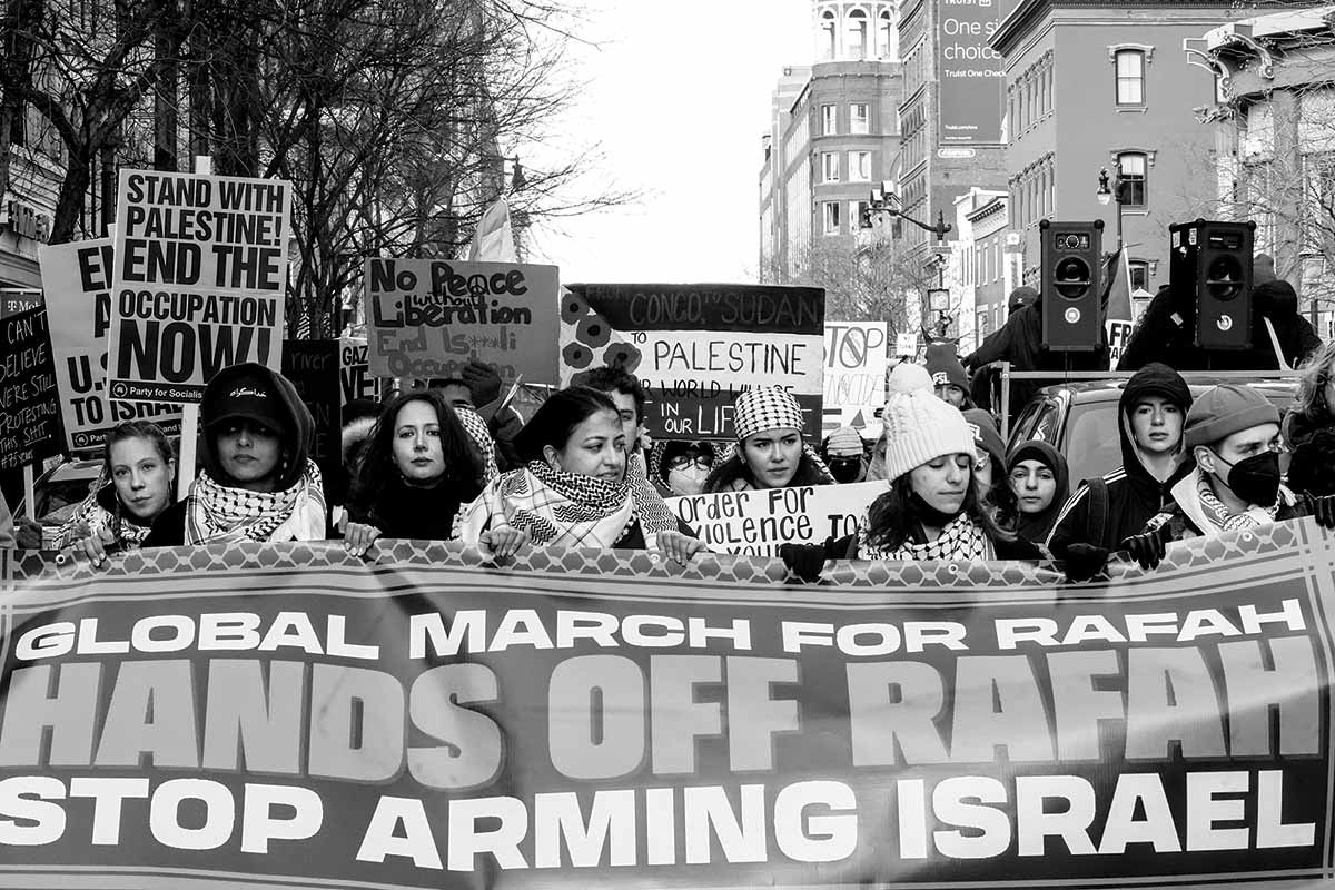 Hundreds rally in front of the “Friendship” arch in Washington, D.C., to demand a cease-fire.