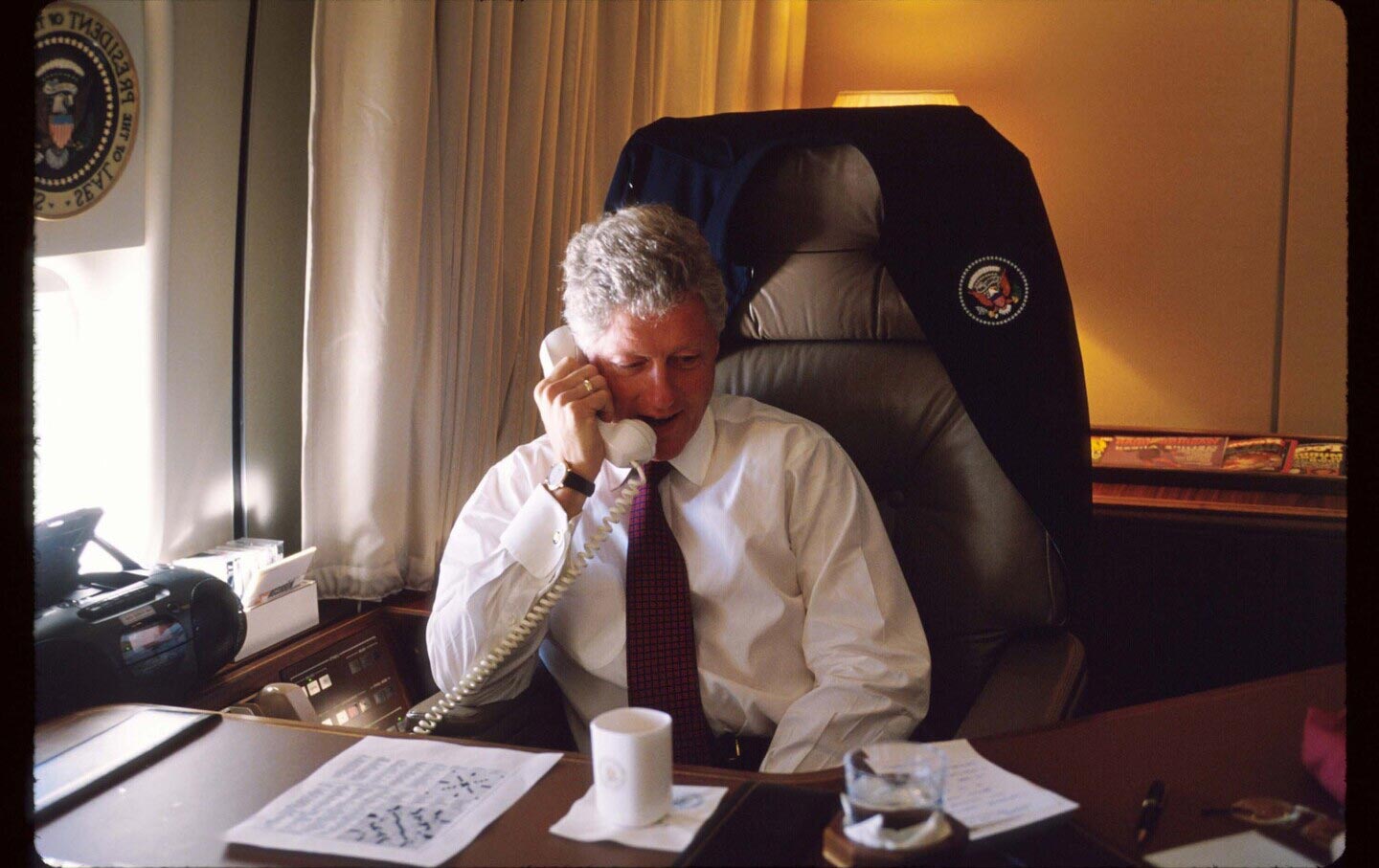 President Clinton speaks on the phone while on Air Force One, November 2, 1997, in the United States.