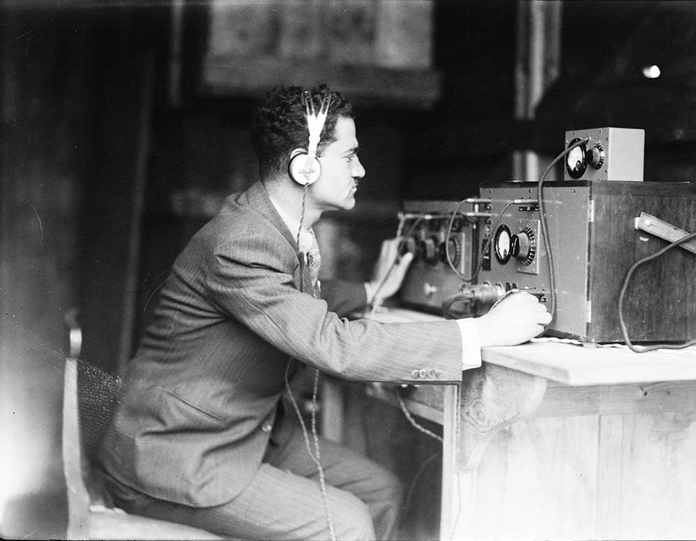 An engineer transmits the inaugural broadcast of the Palestine Broadcasting Service, March 30, 1936.