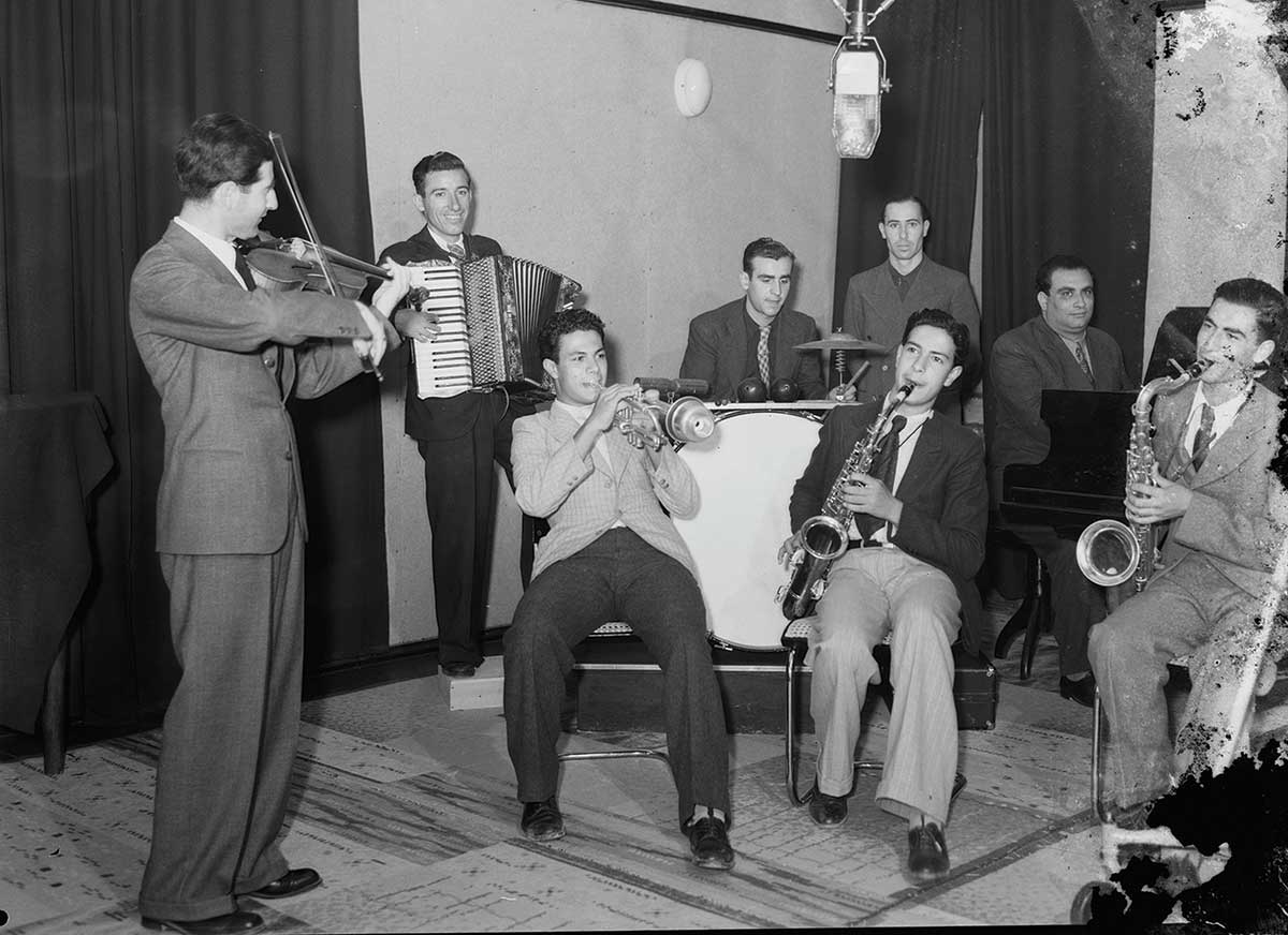 A band performs at the Palestine Broadcasting Service studios in Jerusalem, circa 1936–1946.