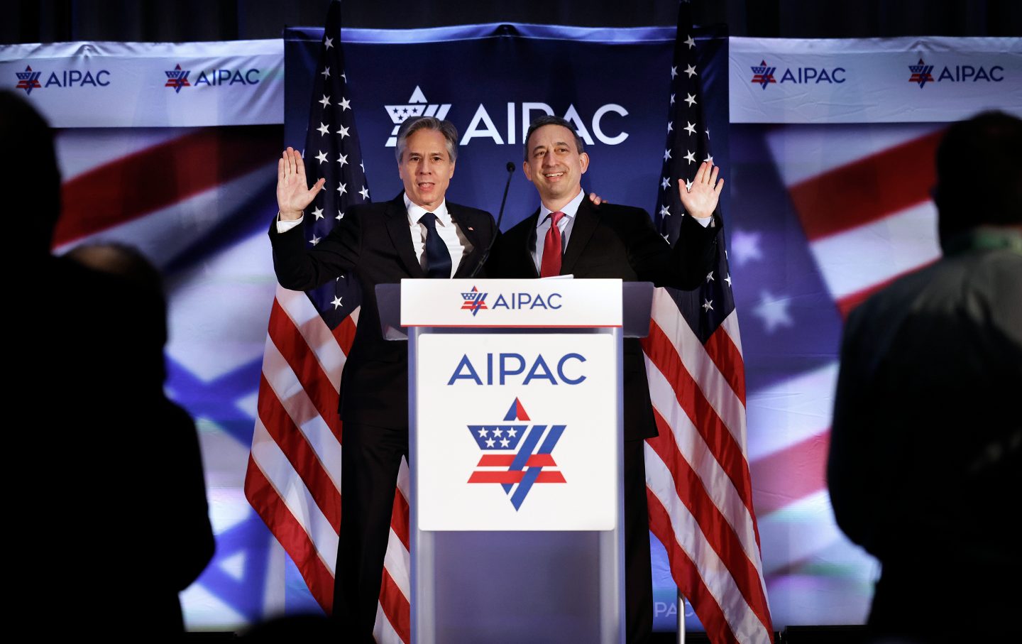 Secretary of State Antony Blinken (L) is welcomed to the stage by American Israel Public Affairs Committee (AIPAC) President Michael Tuchin during the committee's annual policy summit Grand Hyatt on June 05, 2023 in Washington, DC.