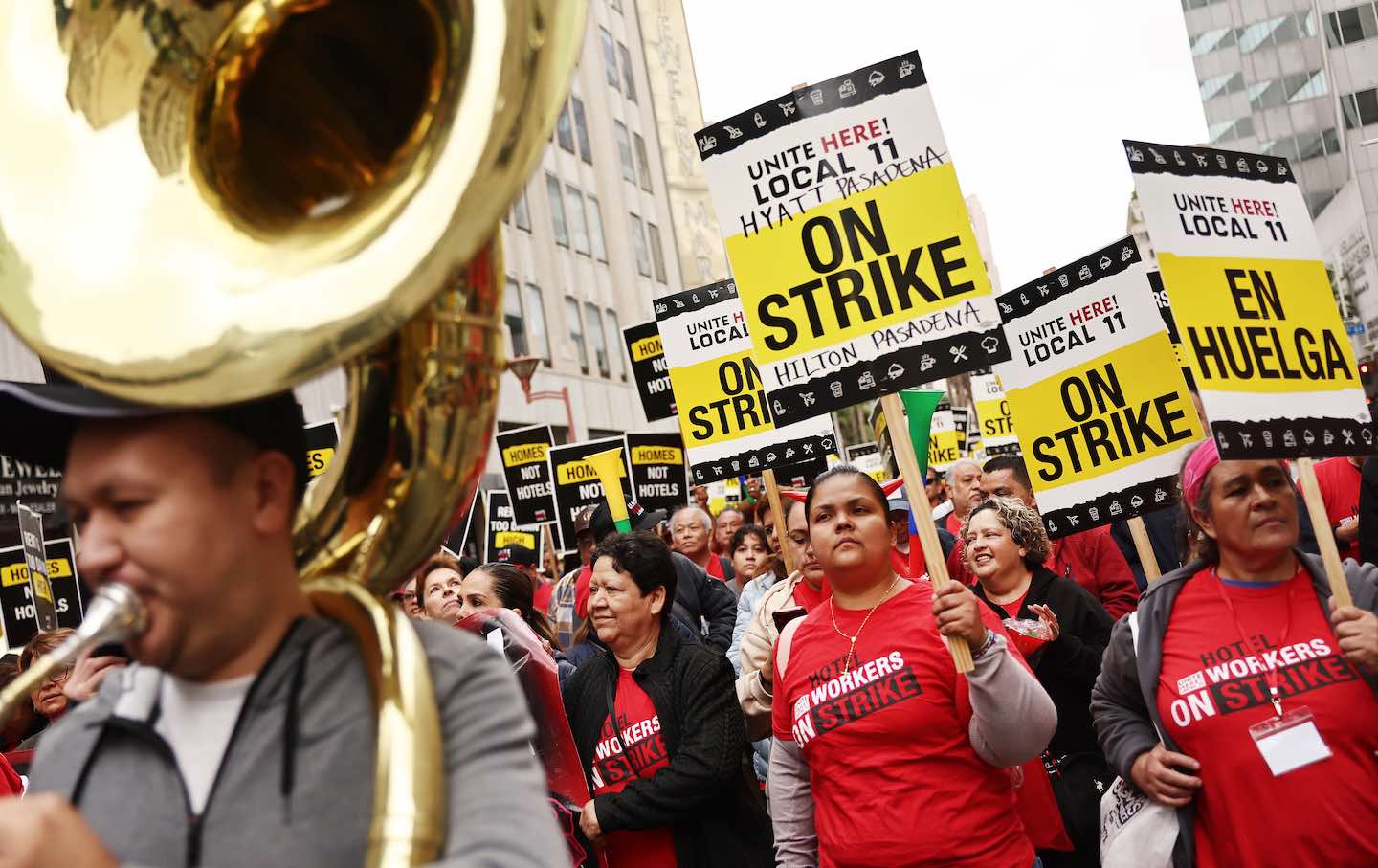 Hotel workers with Unite Here Local 11 march through downtown LA on October 25, 2023.