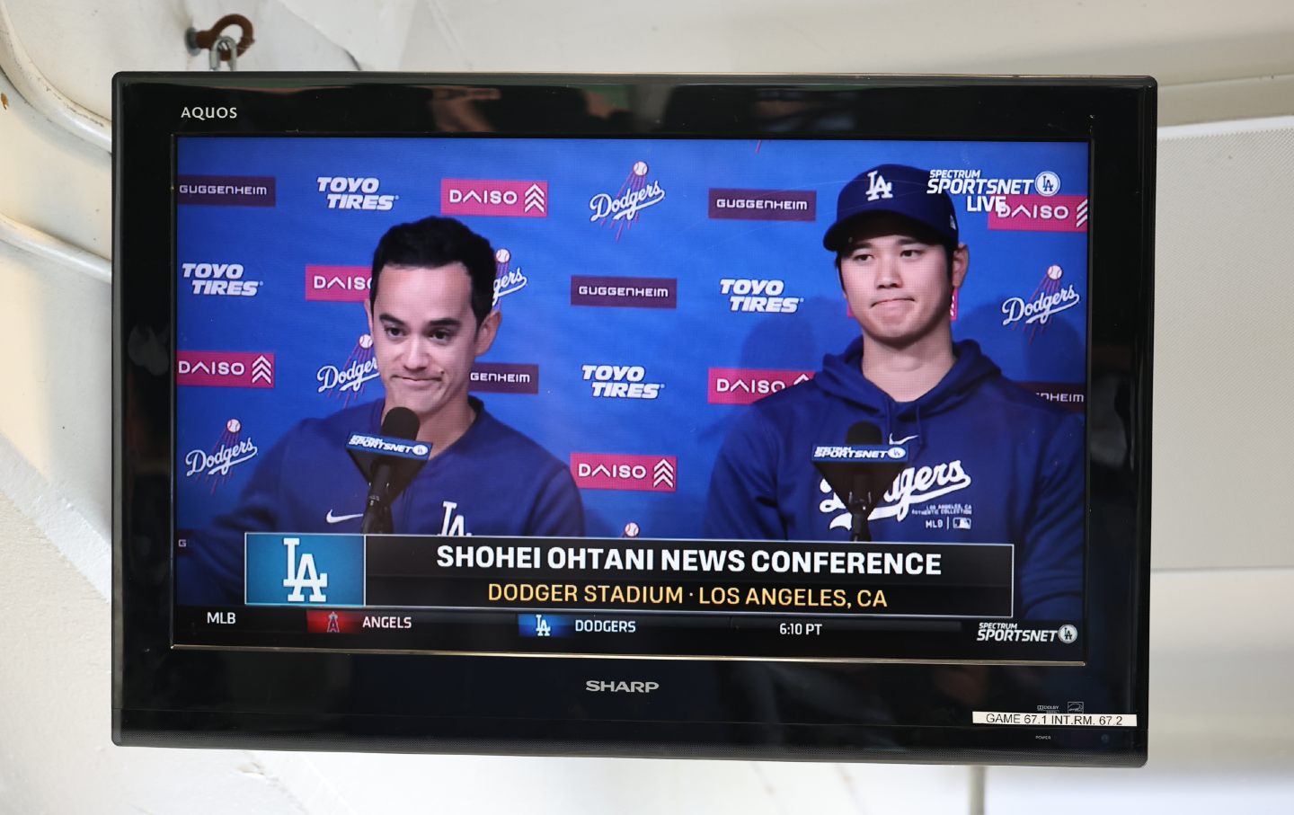 Video screen shows Ohtani speaking at press conference