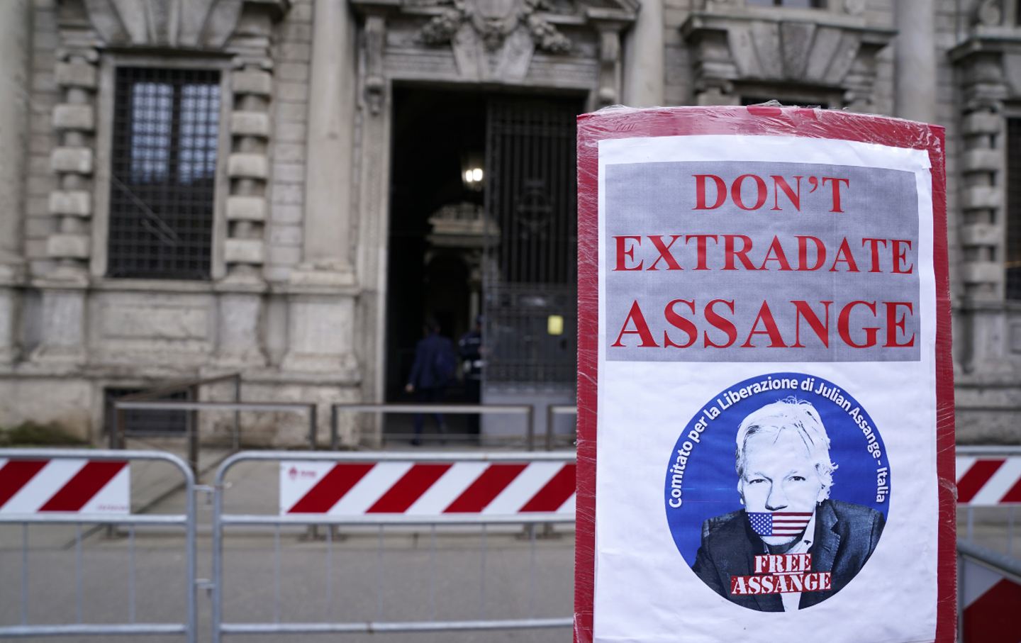 A banner against the extradition of Julian Assange to the United States is displayed in Milan, Italy, on March 11, 2024.