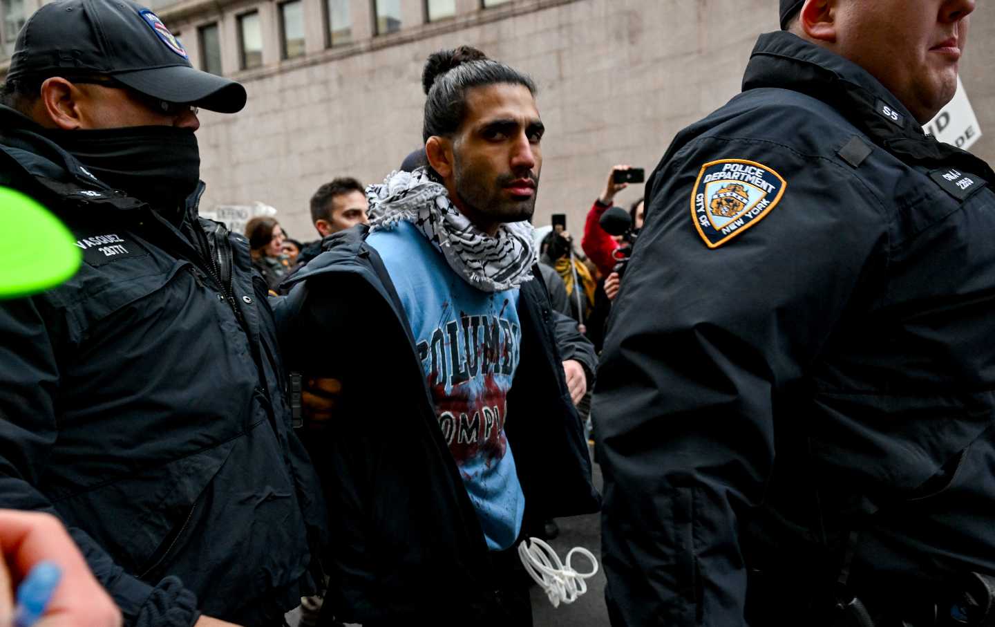 A protester is arrested at a Columbia University demonstration.