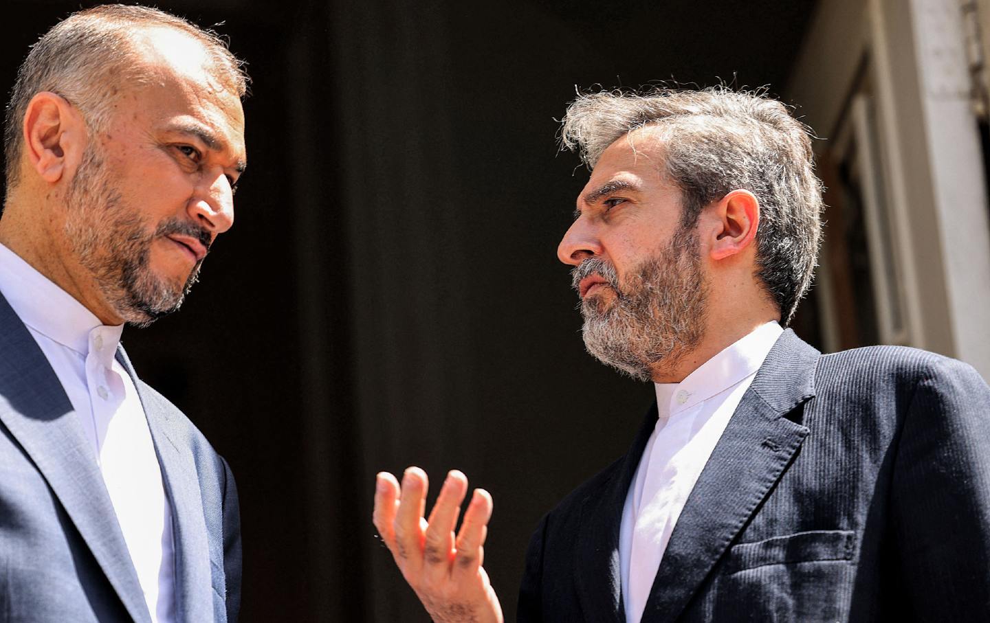 Iranian Foreign Minister Hossein Amir-Abdollahian, left, listens to his deputy foreign minister and chief nuclear negotiator Ali Bagheri Kani, before their meeting with the Russian foreign minister in Tehran on June 23, 2022.