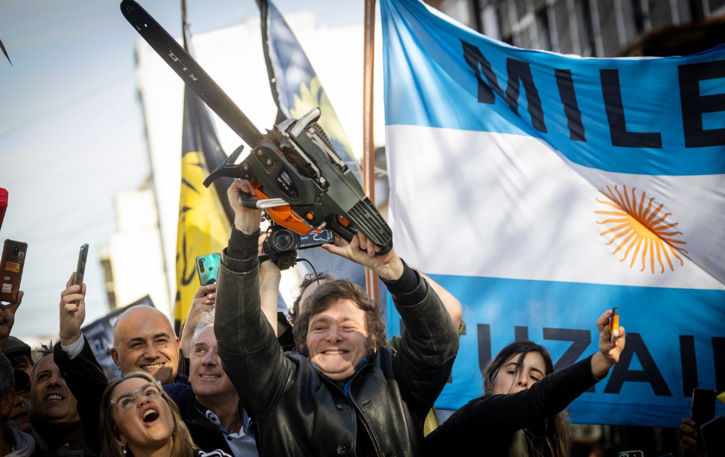 President of Argentina with chainsaw