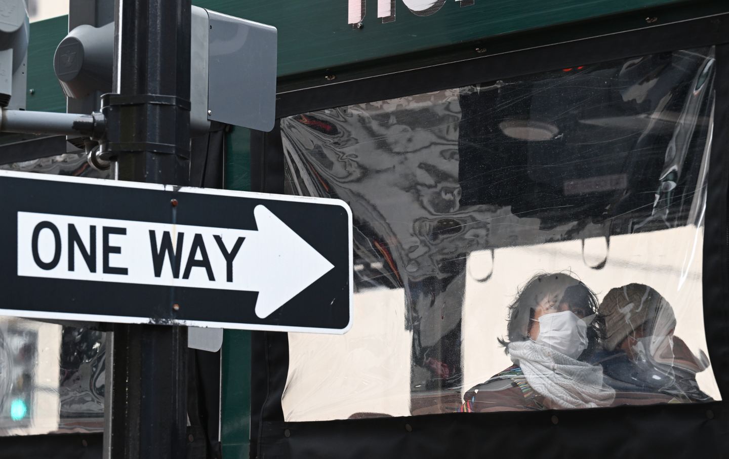 Passengers on a sightseeing bus wear masks on Thursday, January 4, 2024 in Washington, DC.