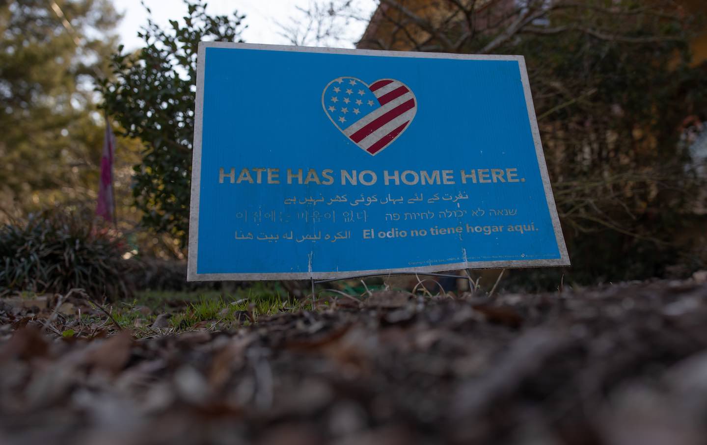 A sign against hate outside a home in Wilmington, North Carolina, on February 22, 2024. Democrats are targeting small towns in a swing state they haven’t won since Barack Obama’s 2008 bid.