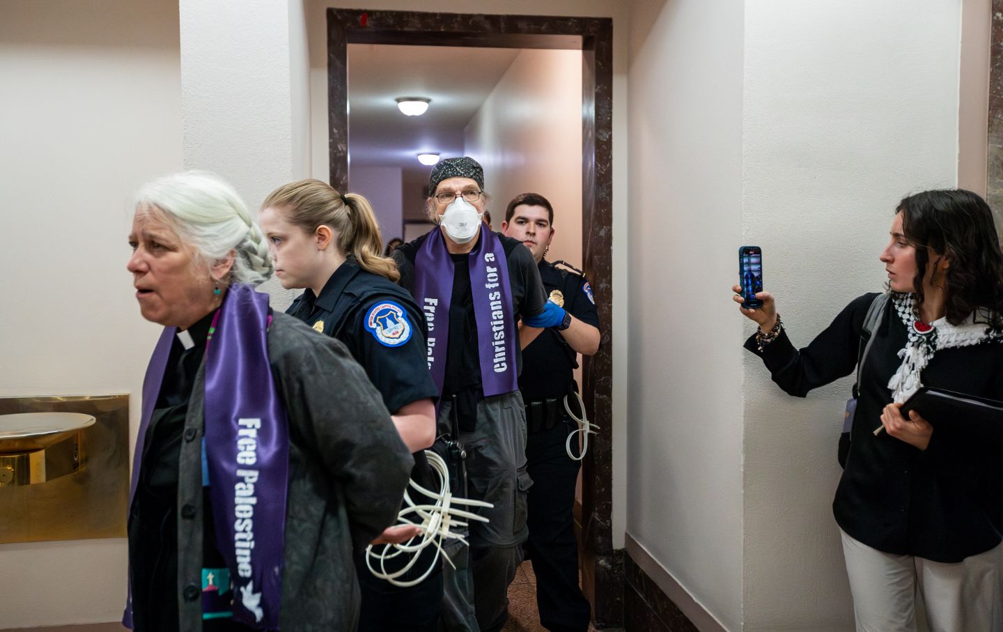 Capitol Police arrest demonstrators with Christians for a Free Palestine for protesting inside a U.S. Senate cafeteria for a ceasefire and aid for Gaza, Washington, DC, April 9, 2024.