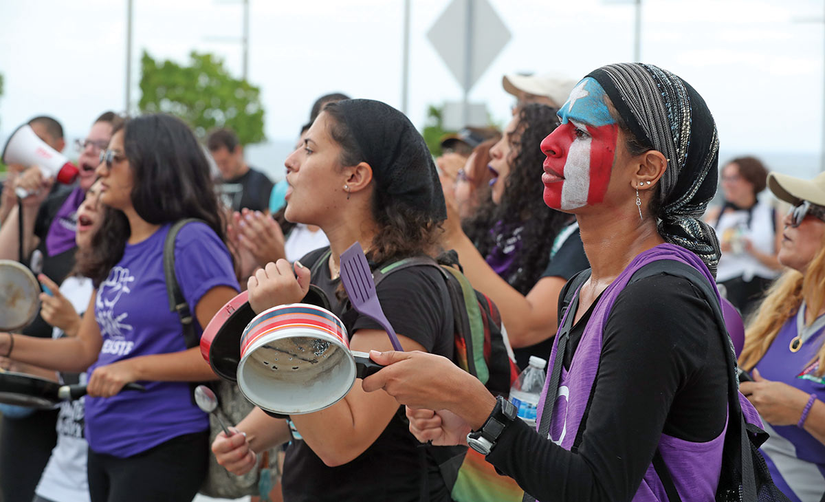 Activists protesting the brutal austerity imposed on the island from Washington, which has made the health disaster worse.