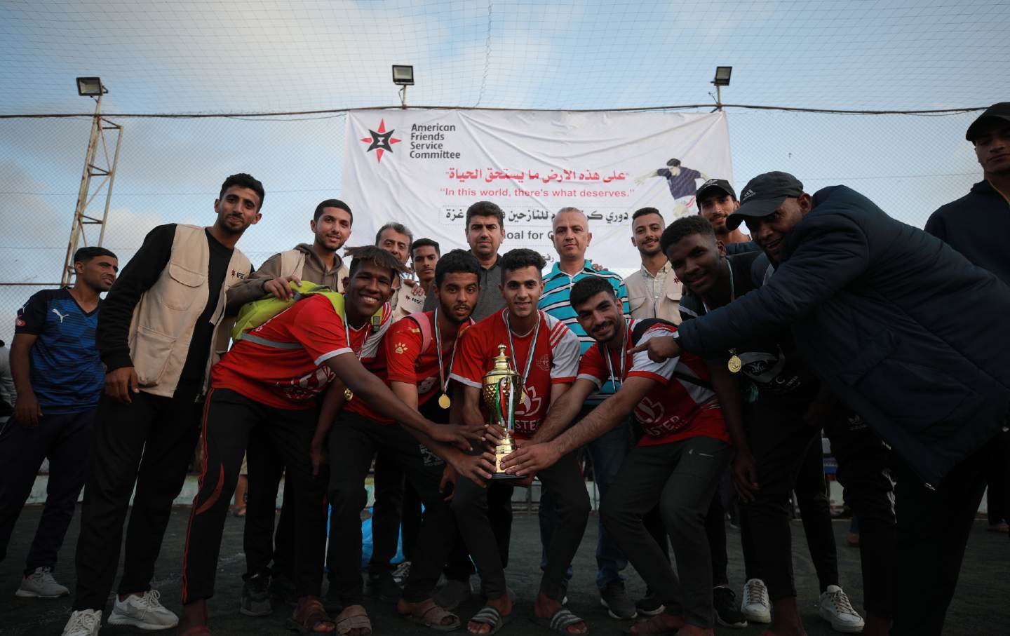 Winning team poses with trophy in Rafah.