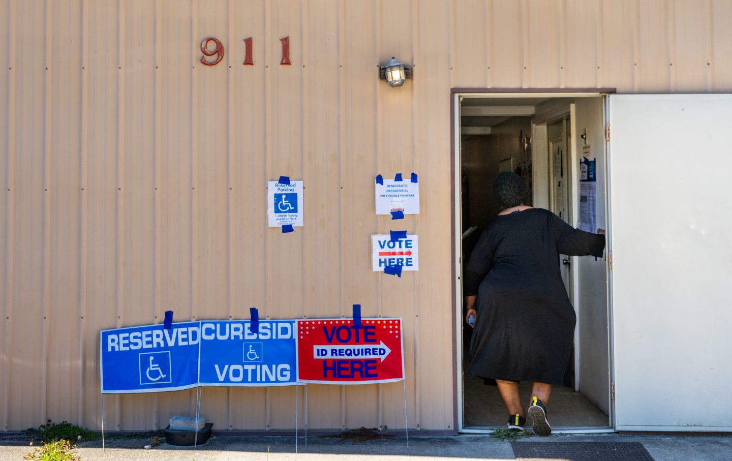 A voter prepares to cast their ballot in the Democratic Primary as they walk in to the Cordesville Rural Fire Department on February 03, 2024 in Cordesville, South Carolina.