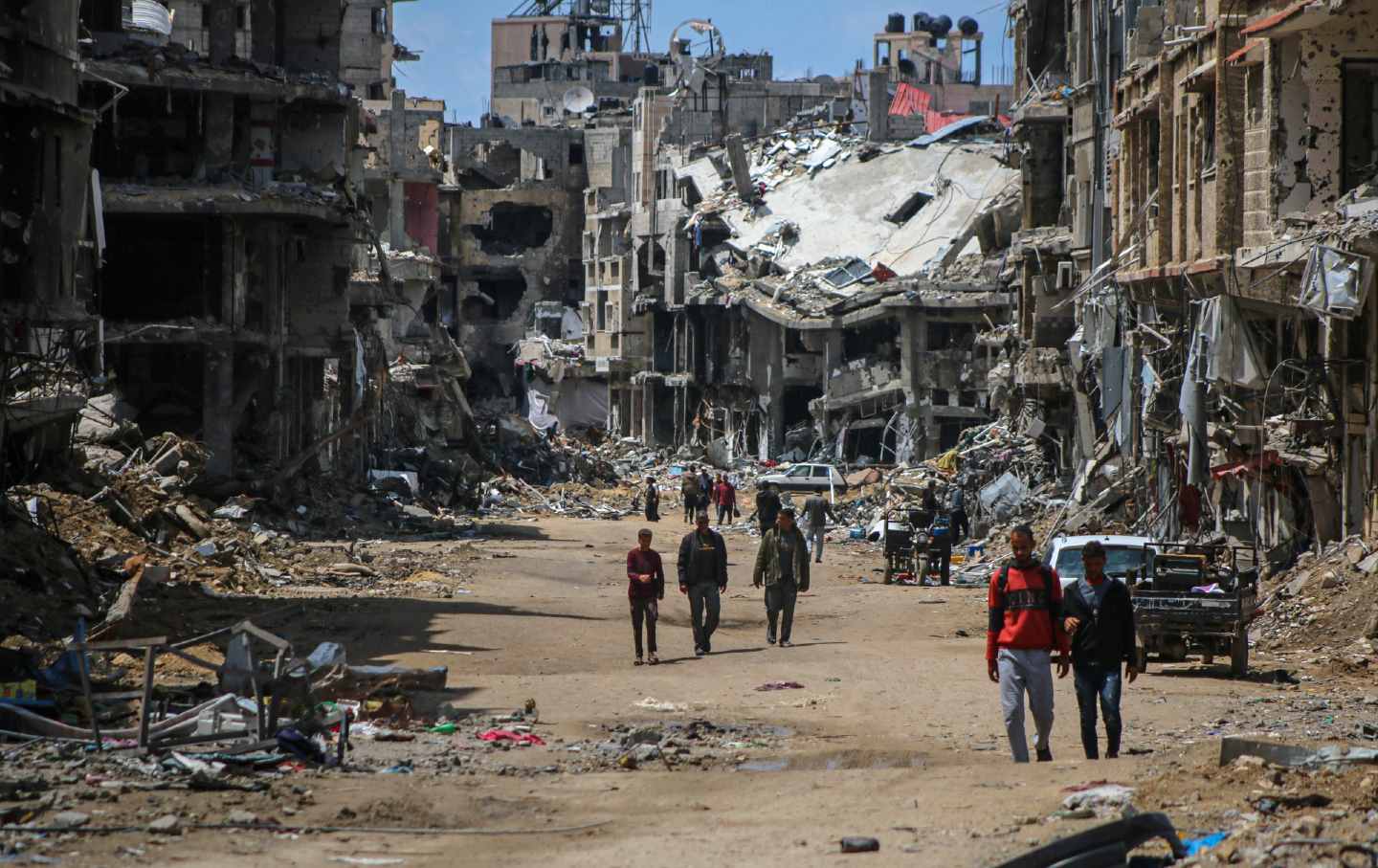 Palestinians return to inspect the destruction following the withdrawal of Israeli troops in Khan Younis, southern Gaza, on Wednesday, April 10, 2024.