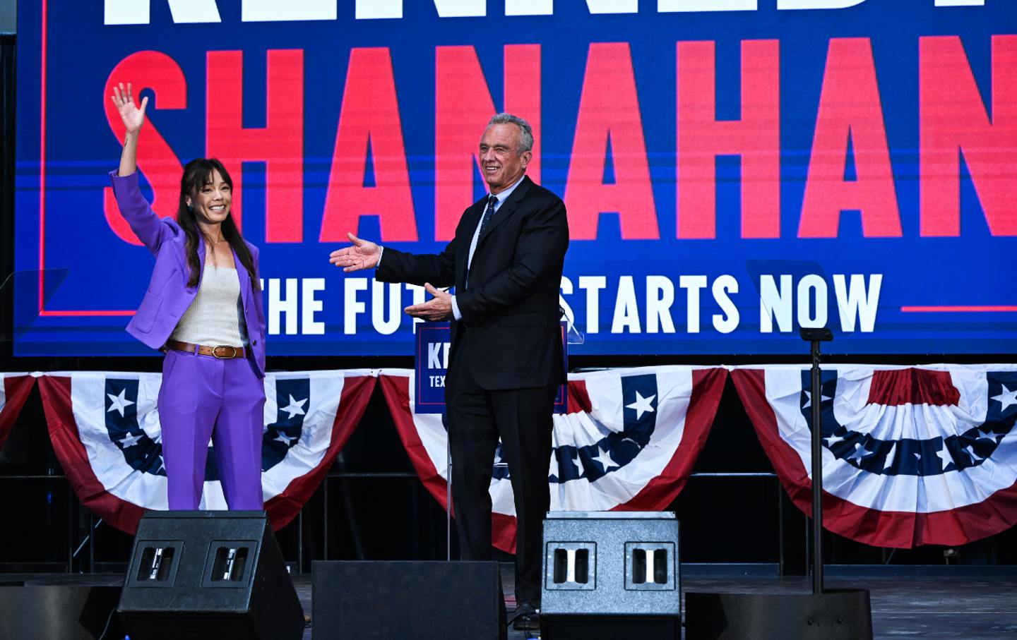 Robert F. Kennedy Jr. introduces California attorney Nicole Shanahan as his running mate for vice president during an event in Oakland, Calif.,on March 26, 2024.