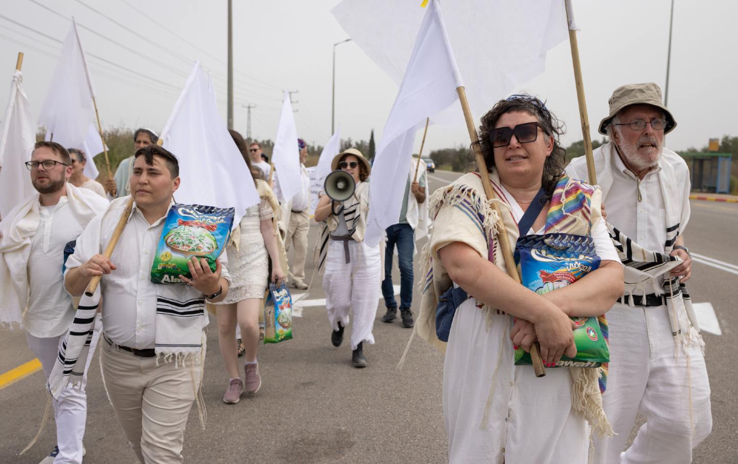 A delegation of rabbis from the United States and Israel march toward the Erez/Beit Hanoun Crossing at the northern tip of the Gaza Strip on April 26, 2024.