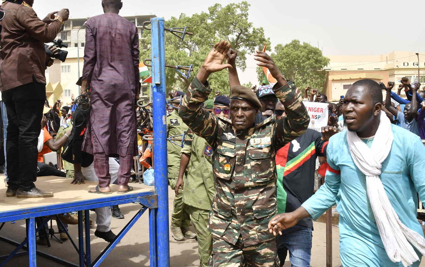 Colonel Ibro Amadou, an influential member of the military regime in power in Niger, reacts during his arrival to a demonstration for the immediate departure of United States Army soldiers deployed in northern Niger in Niamey, on April 13, 2024.